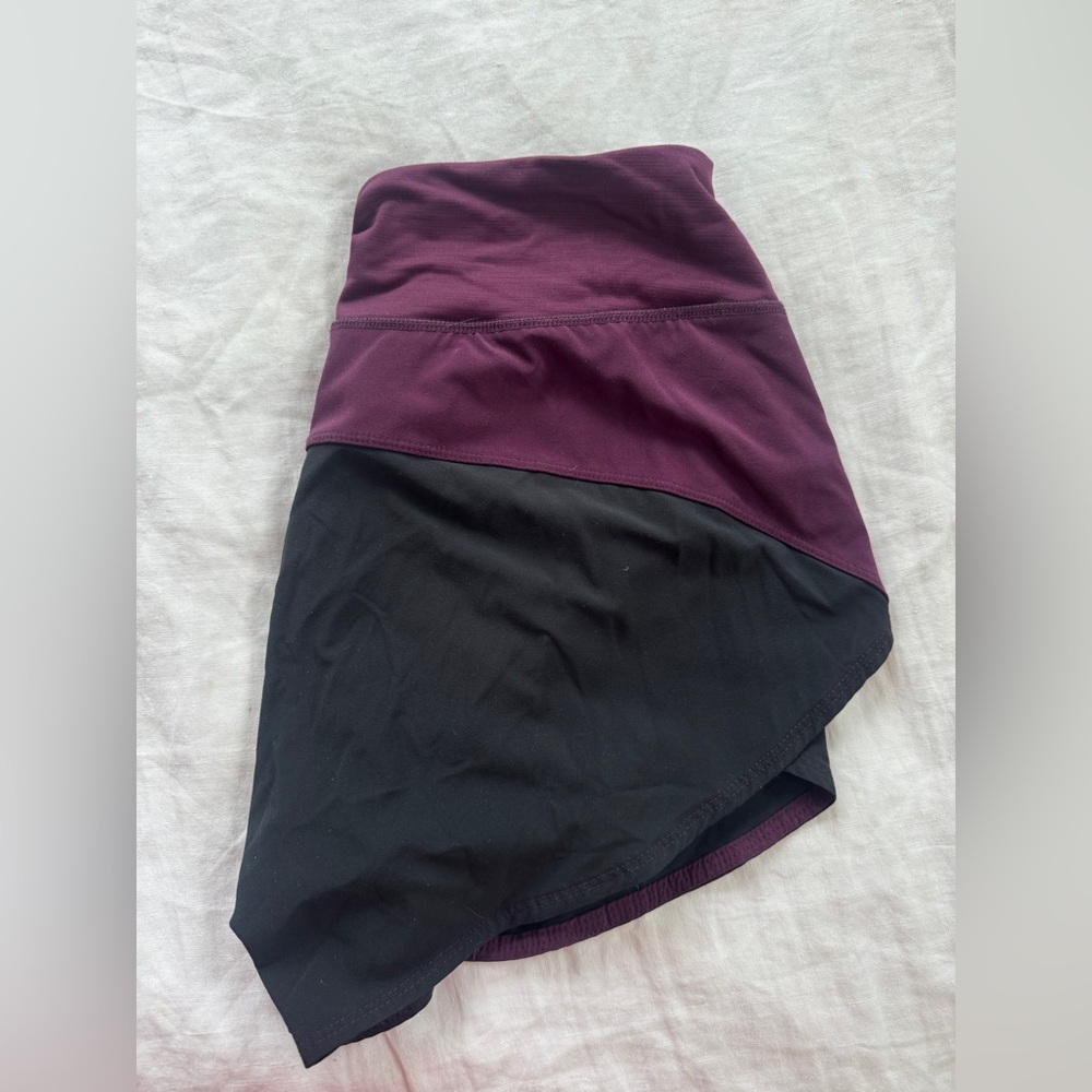 Outdoor voices women’s athletic shorts in black & purple colorblock
